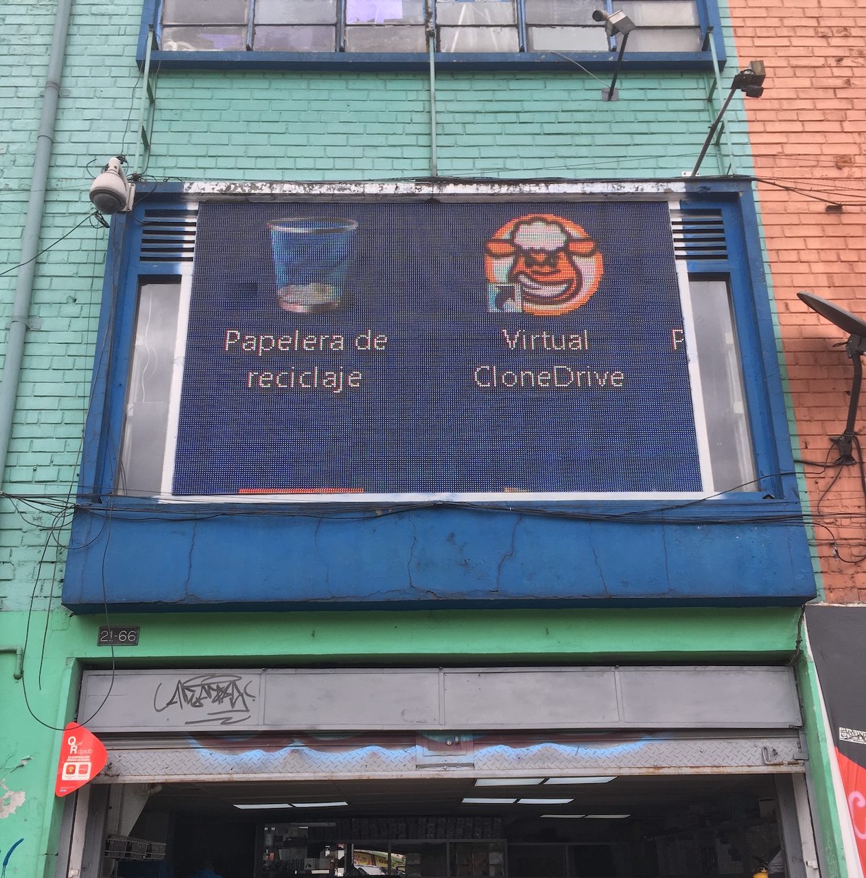 computer desktop instead of an ad displayed on a public screen on a street in Bogota